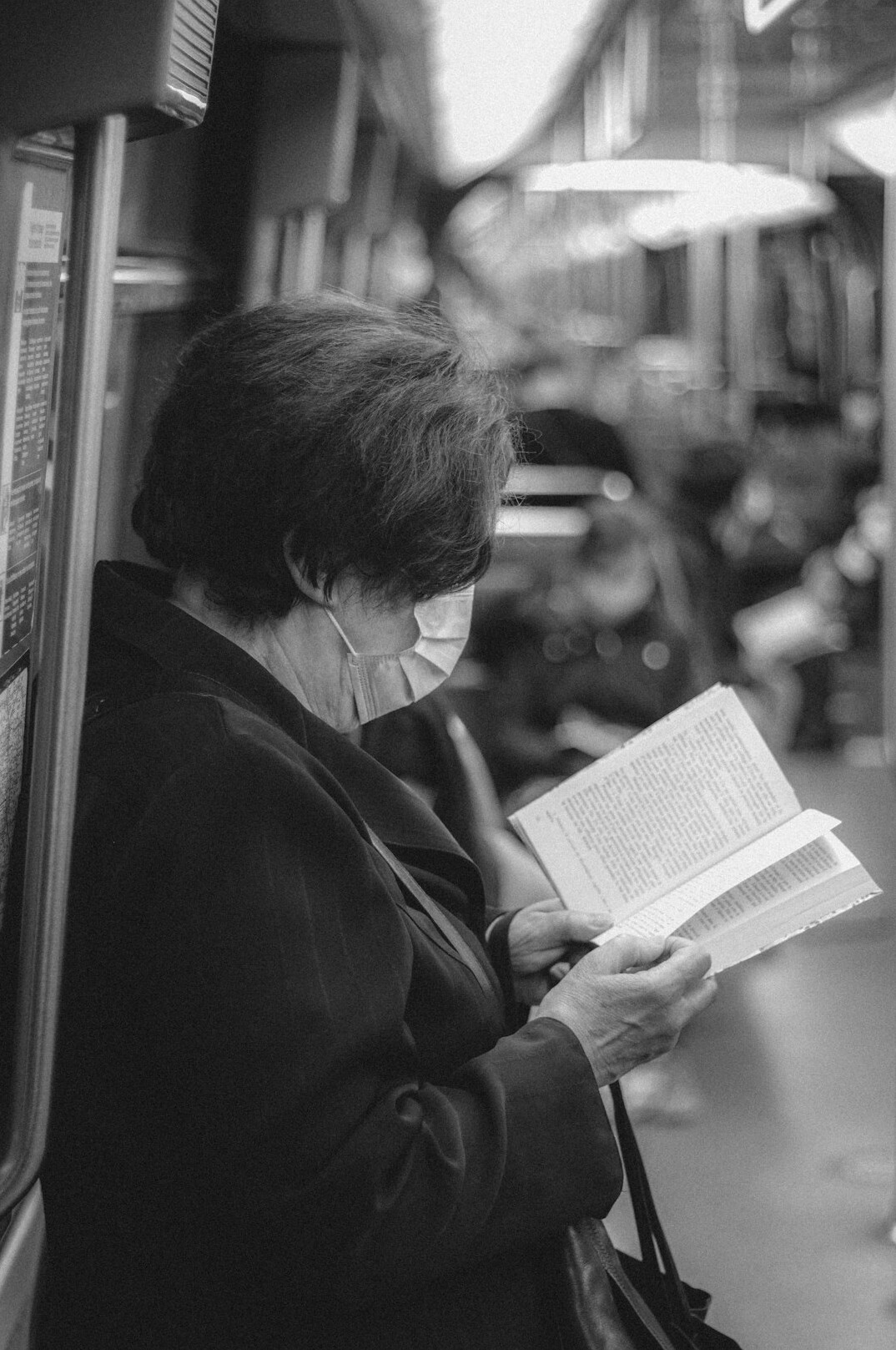 elderly woman reading mystery book