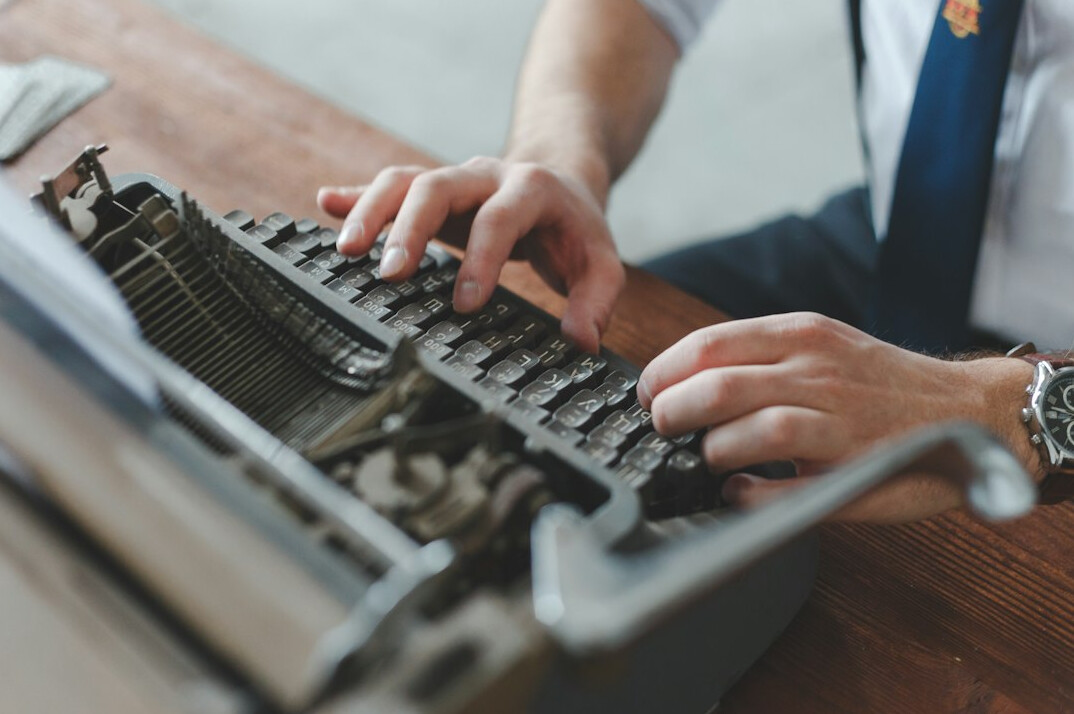 mystery author at typewriter